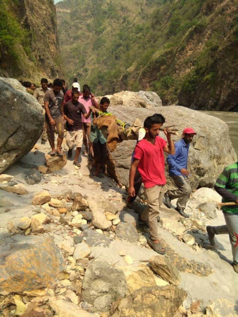 Dead bodies being removed in very bad condition