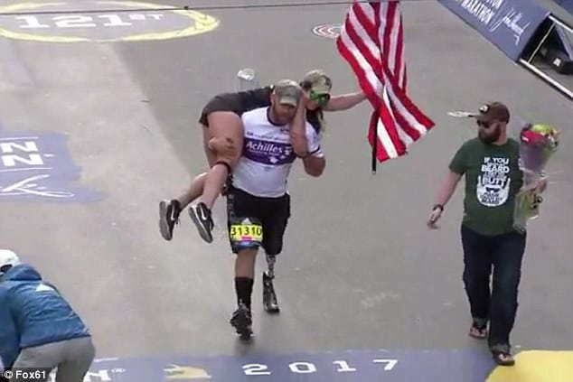 US infantryman who carries wife across finish line at Boston Marathon 