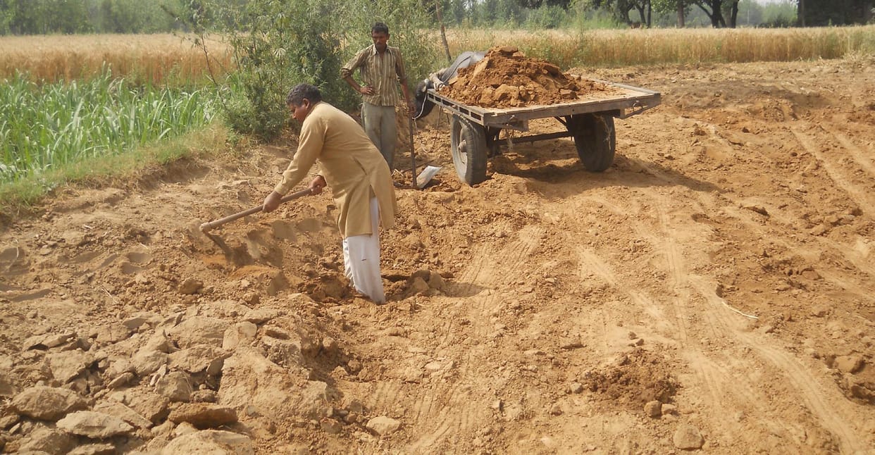 Illegal mining of soil.