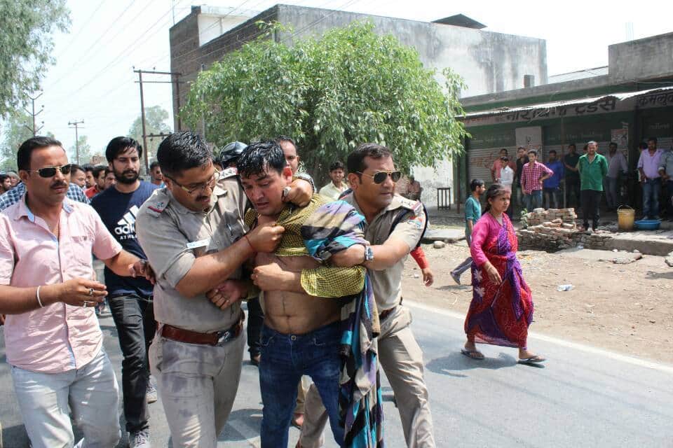 photos of protest against wine shop