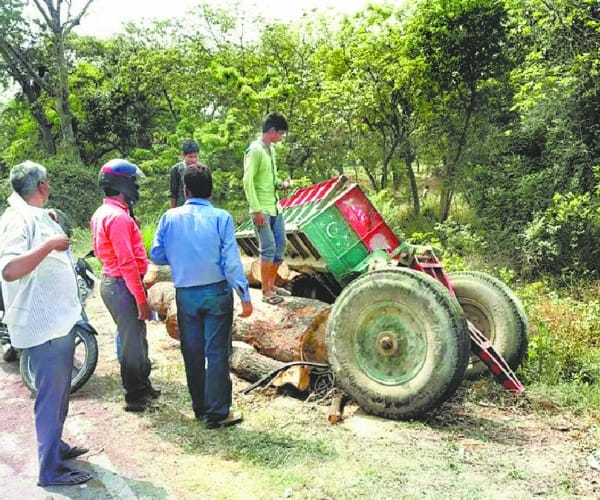 Dump truck fired, two injured