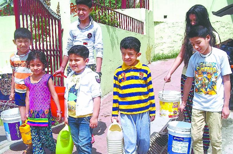 Children forced to carry water