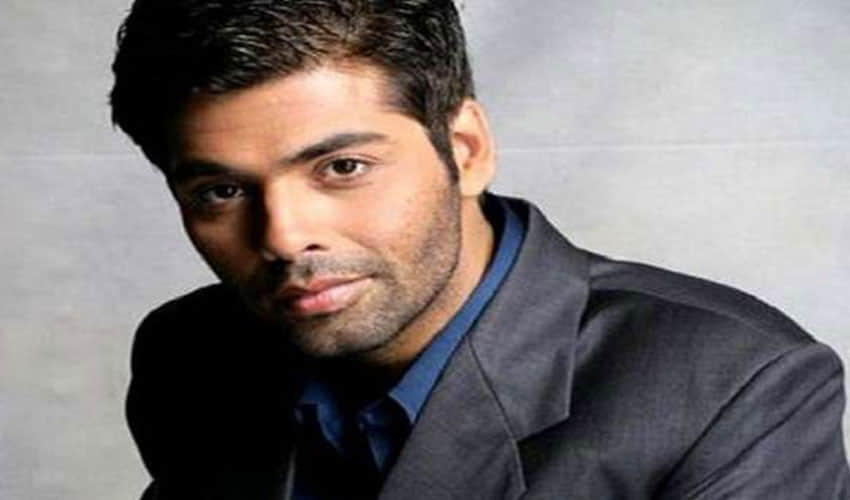 karan johars wanted singing but his mother never gave the permission