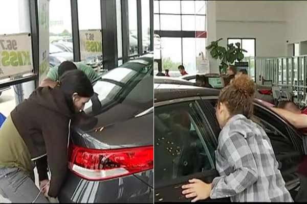 women won car after kissing it 50 hr continiously