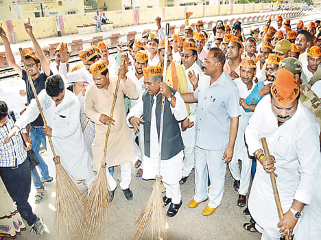 Minister broom on railway platform