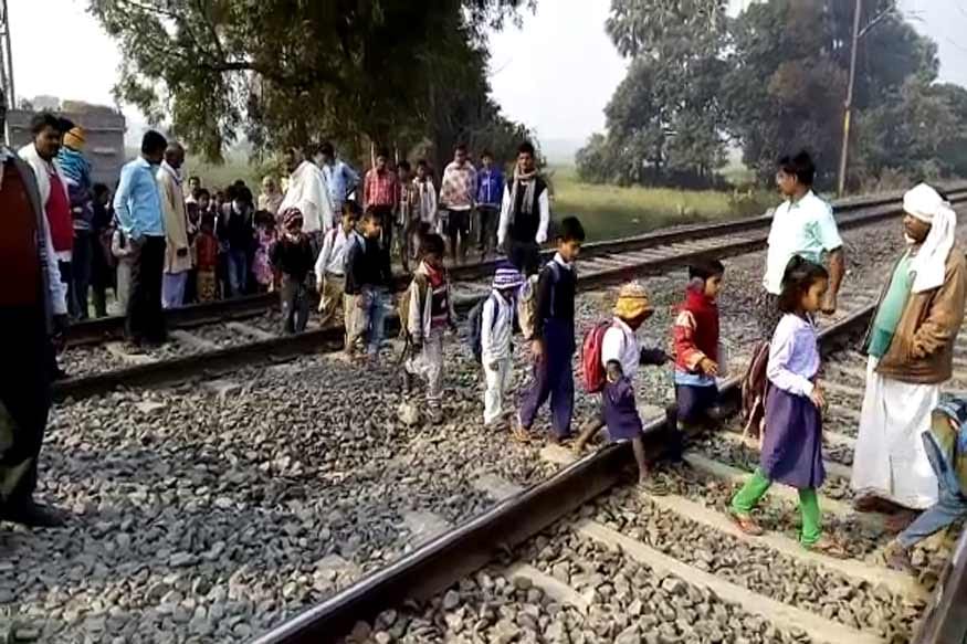 women in a village of Bihar worship railway track