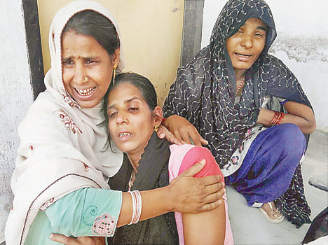 Three children immersed in pond, one killed