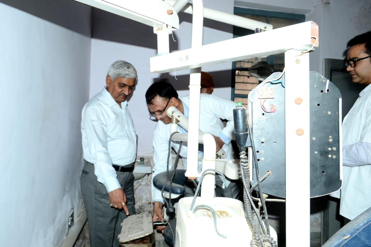 Employees changing sheets in district hospital
