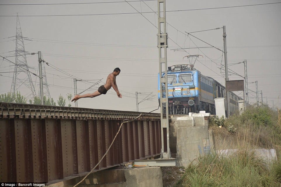Ghaziabad youngsters  risk death before express passes in insane craze