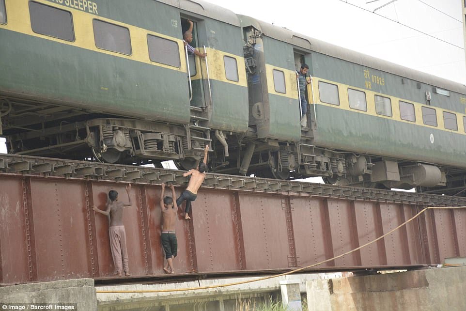 Ghaziabad youngsters  risk death before express passes in insane craze
