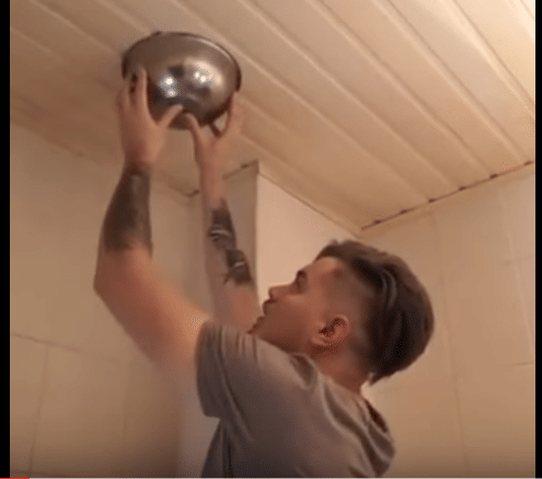 a boy tries to trap a spider, what happens next is really funny