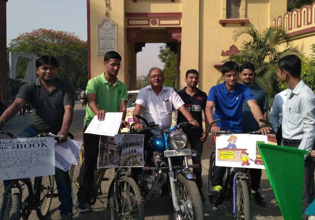 bhu iitians launch cycile yatra for library campaign
