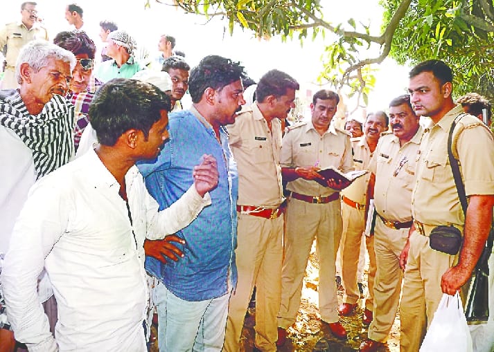 youth's body found hanging on tree