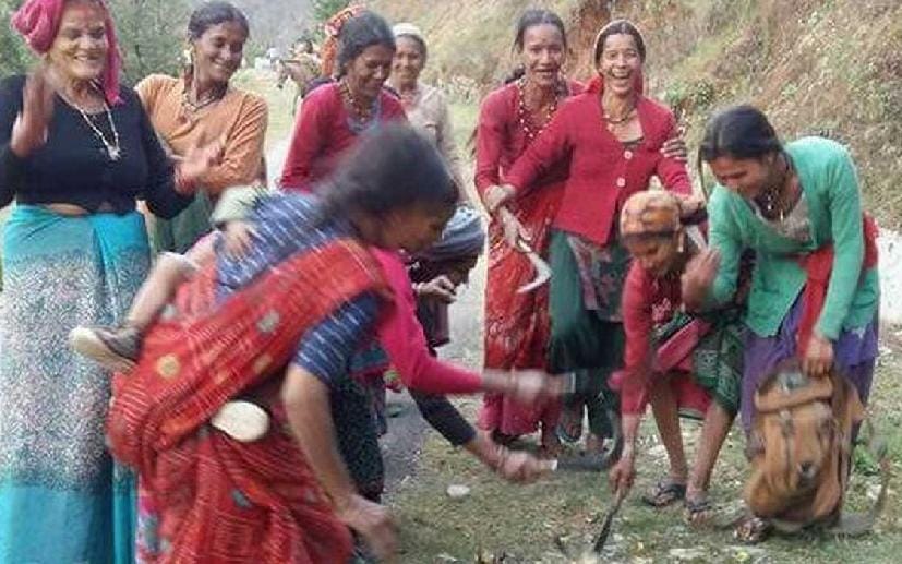 Women set fire to wine bottles