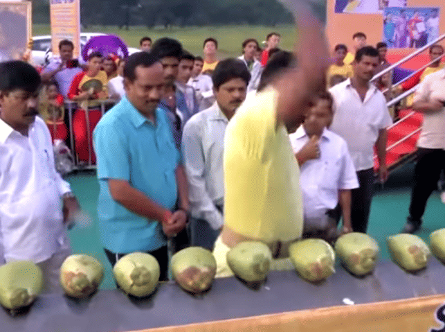 World Record for Smashing 92 coconut with Elbow