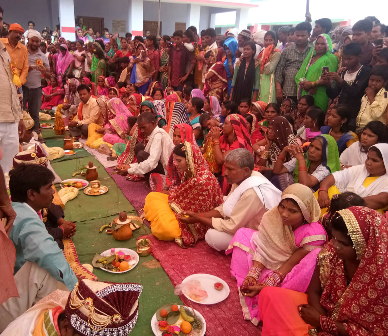 12 couples tied to wedding bond