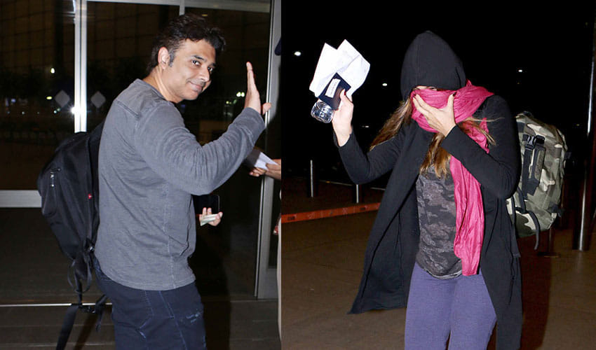 Nargis Fakhri & Uday Chopra Spotted At Mumbai Airport Where Nargis Hides Her Face