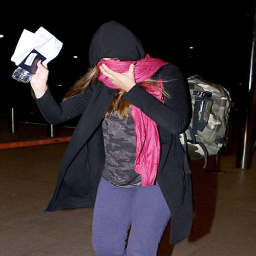 Nargis Fakhri & Uday Chopra Spotted At Mumbai Airport Where Nargis Hides Her Face