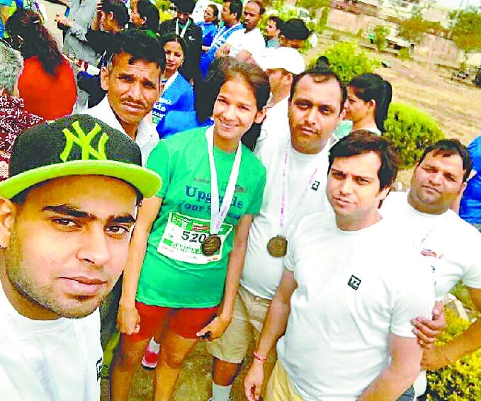Third position of dignity in the Dehradun Half Marathon