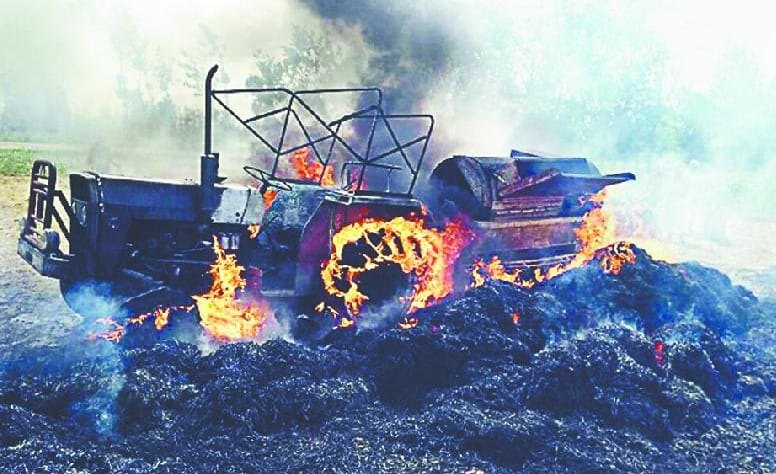Fire in tractor and threshing machine