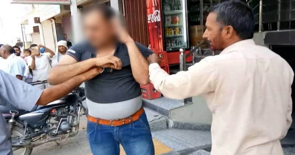 policeman beaten by people after handed with women in hotel