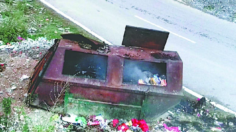 Garbage being burned at the place of waste disposal