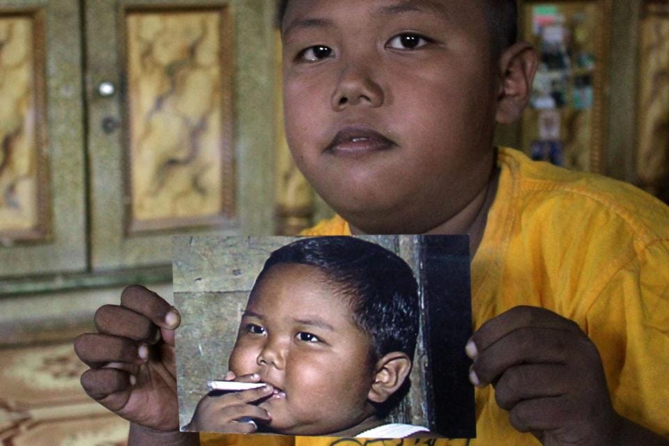 two-year-old with a 40 A DAY smoking habit, he is now 9
