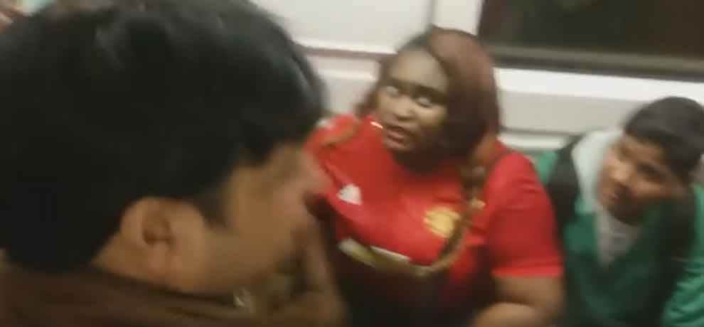 african woman removes her cloth in delhi metro, video goes viral