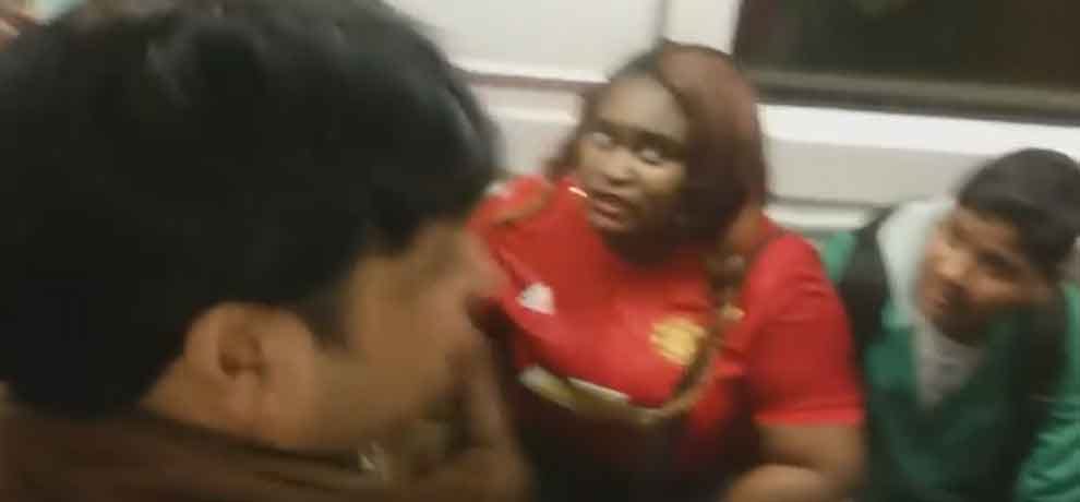 african woman removes her cloth in delhi metro, video goes viral