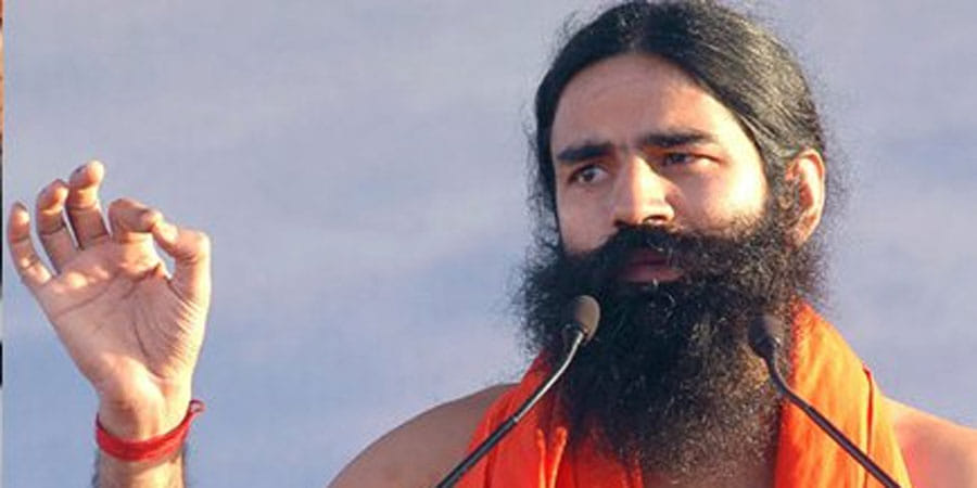 rohtak court cancelled non bailable warrant against yoga guru baba ramdev 