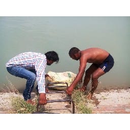 fathebad, murder, beat him, dead body found, river, fatehabad