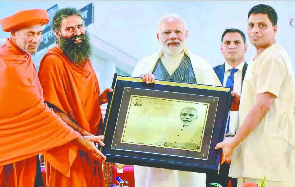 baba ramdev gave title of rashtrarishi to PM Modi
