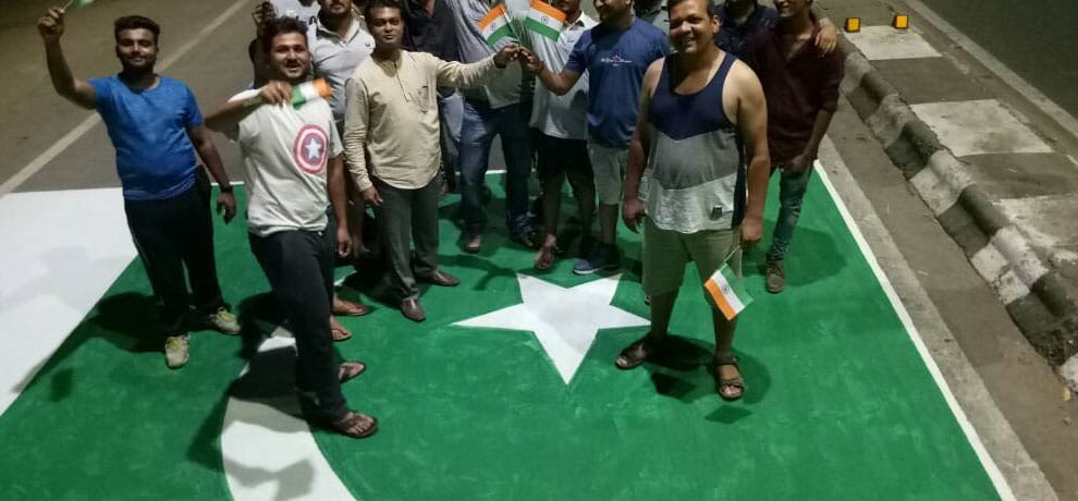 gujarat man arrested for draw pakistan flag on road  to protest mutilation of 2 soldiers in LOC