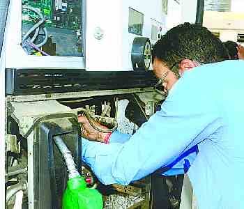 Print on three petrol pumps, two machines seized