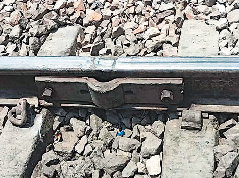 train pases through open jogal plate