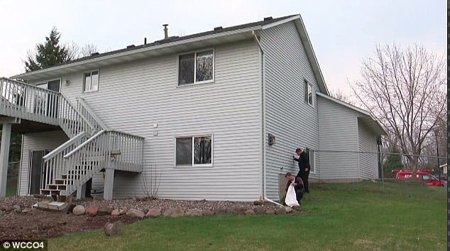 Women baffled with 100 snakes in her new home