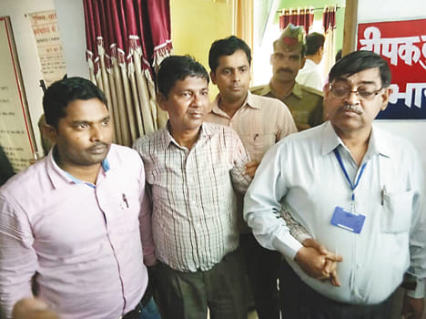 red handed caught while taking bribe