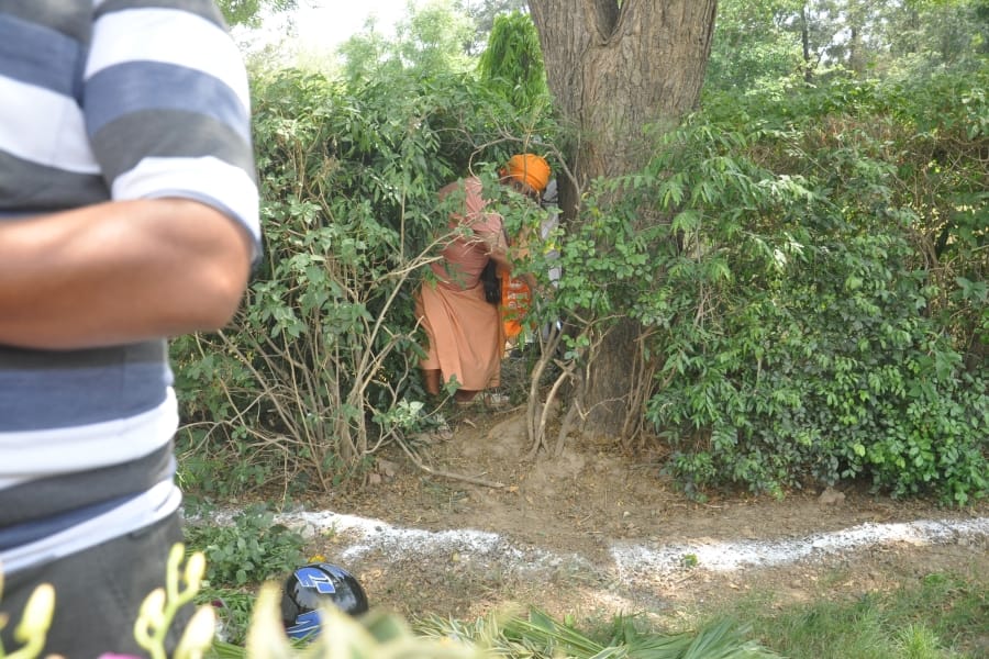 who was these person behind cm yogi in agra