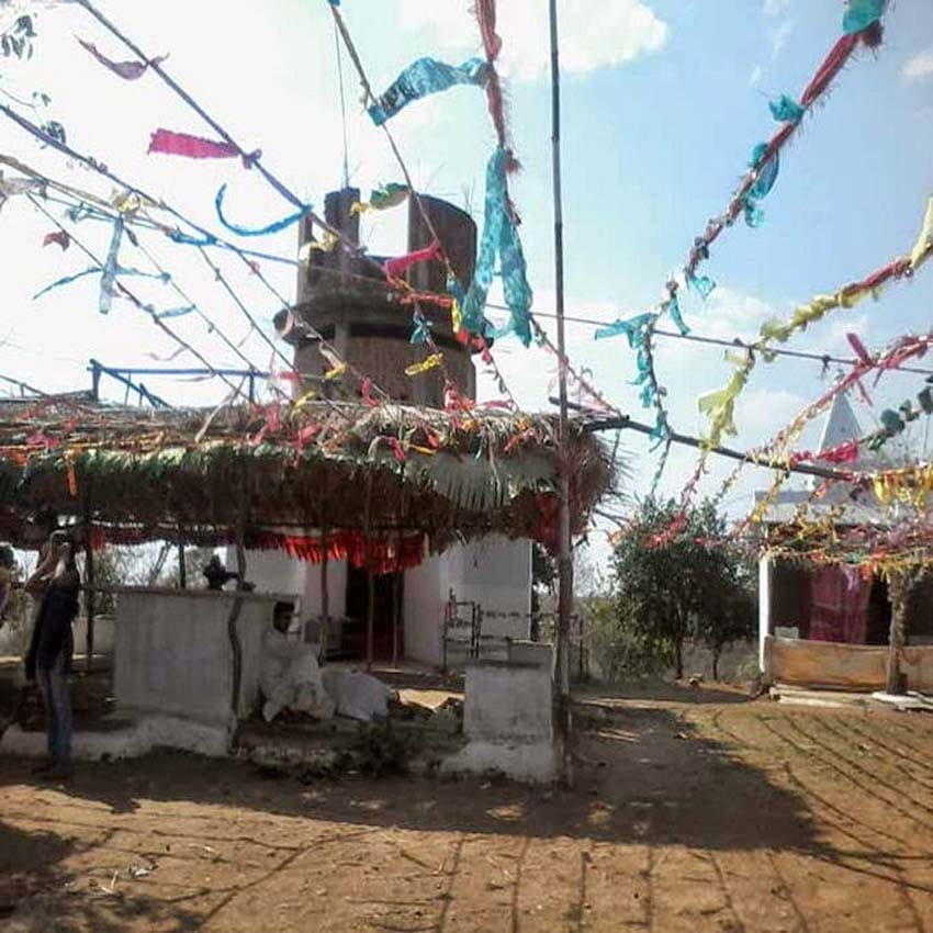 devotees offer footwear to goddess