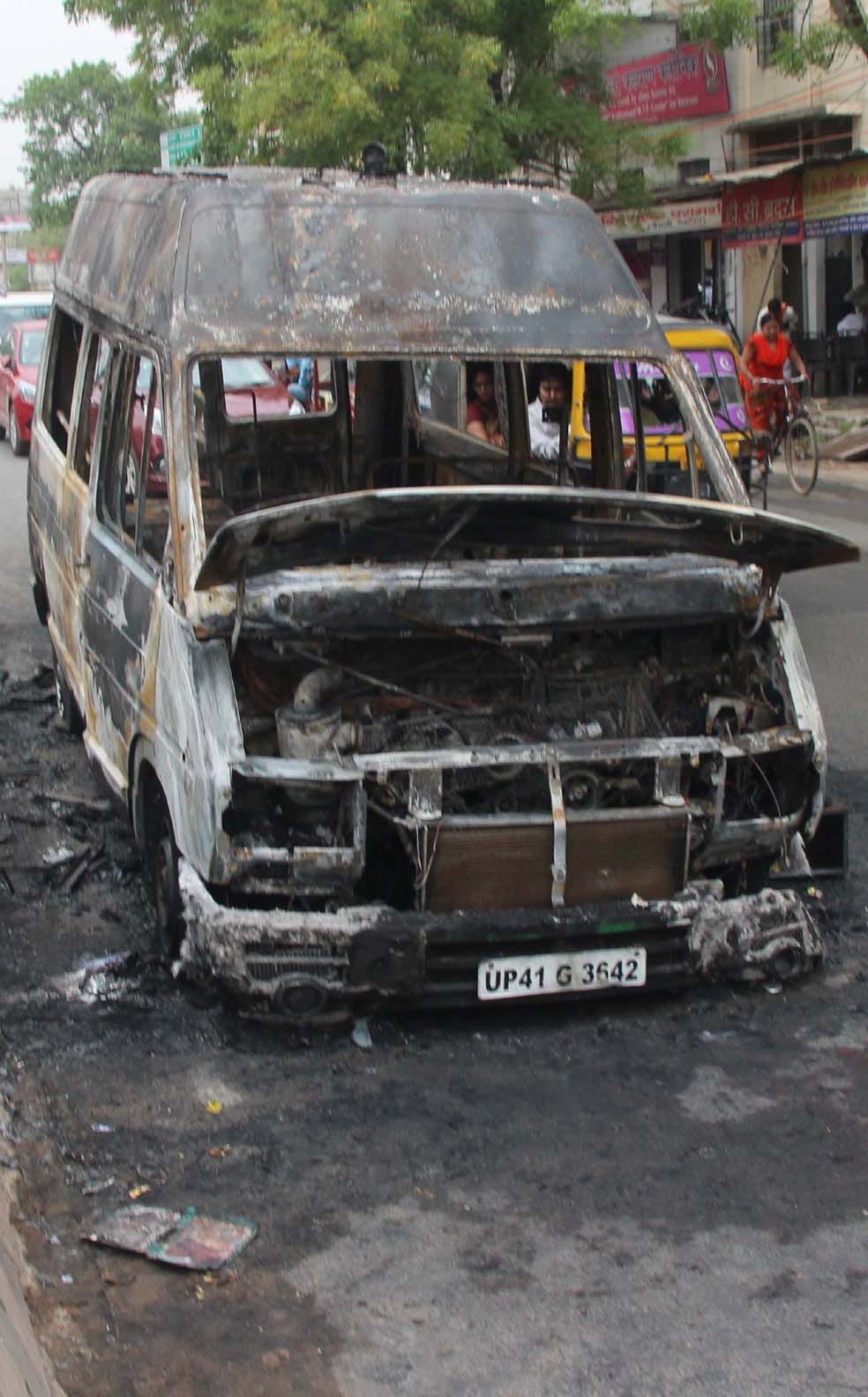 see the photos of burning ambulance at varanasi