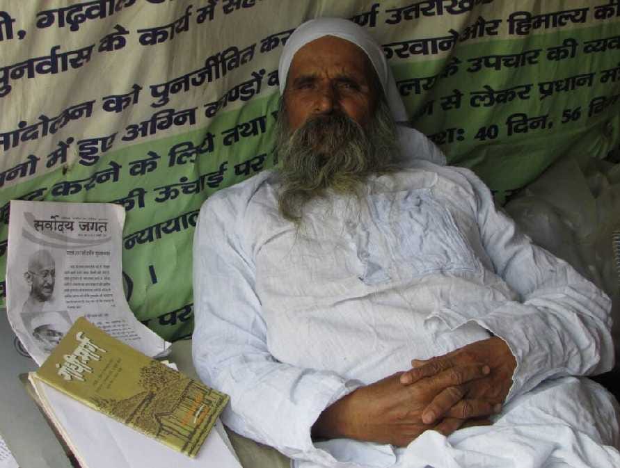 Seventy-year old man is sitting on satyagraha 