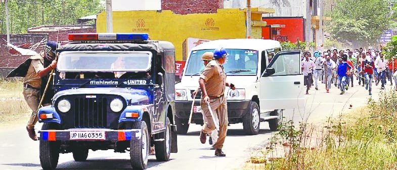 Policeman and officer ran away from stones