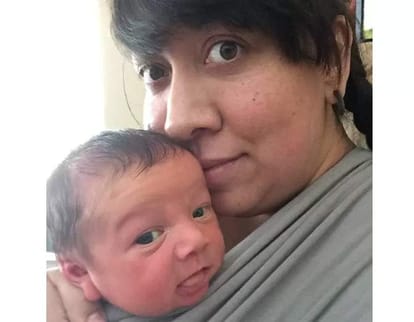 truth behind the viral photo of baby with holding contraceptive device 