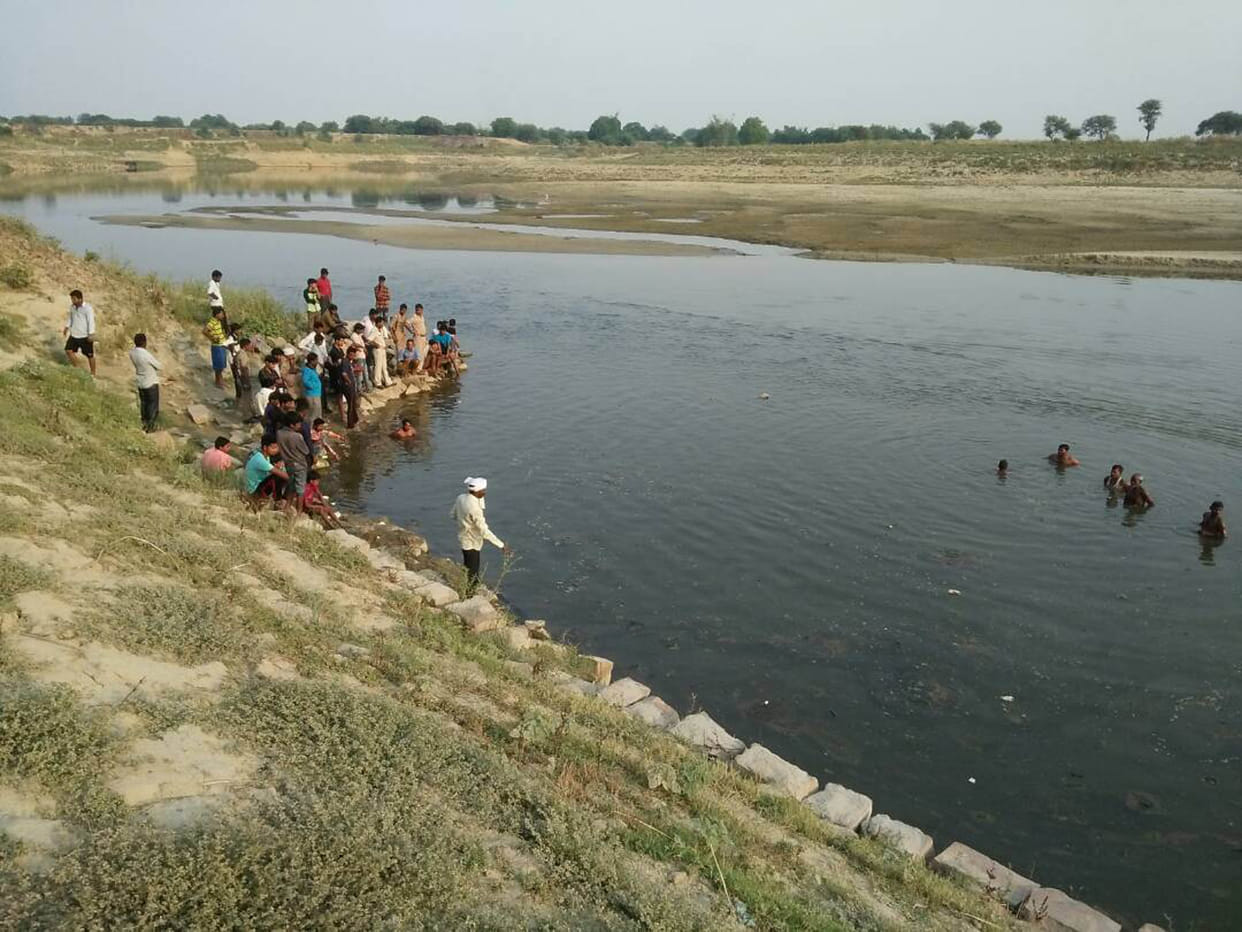 Woman submerged in Rapti, seek exploration