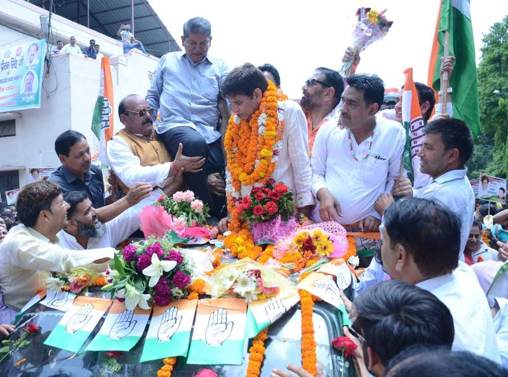 harish rawat in pcc chief Pritam's Congratulatory Ceremony