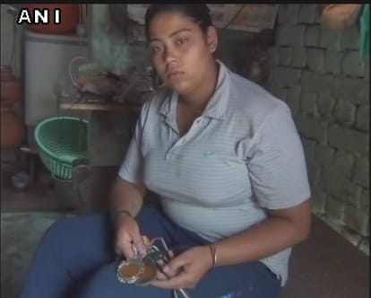 National champion powerlifter forced to work at father’s tea shop