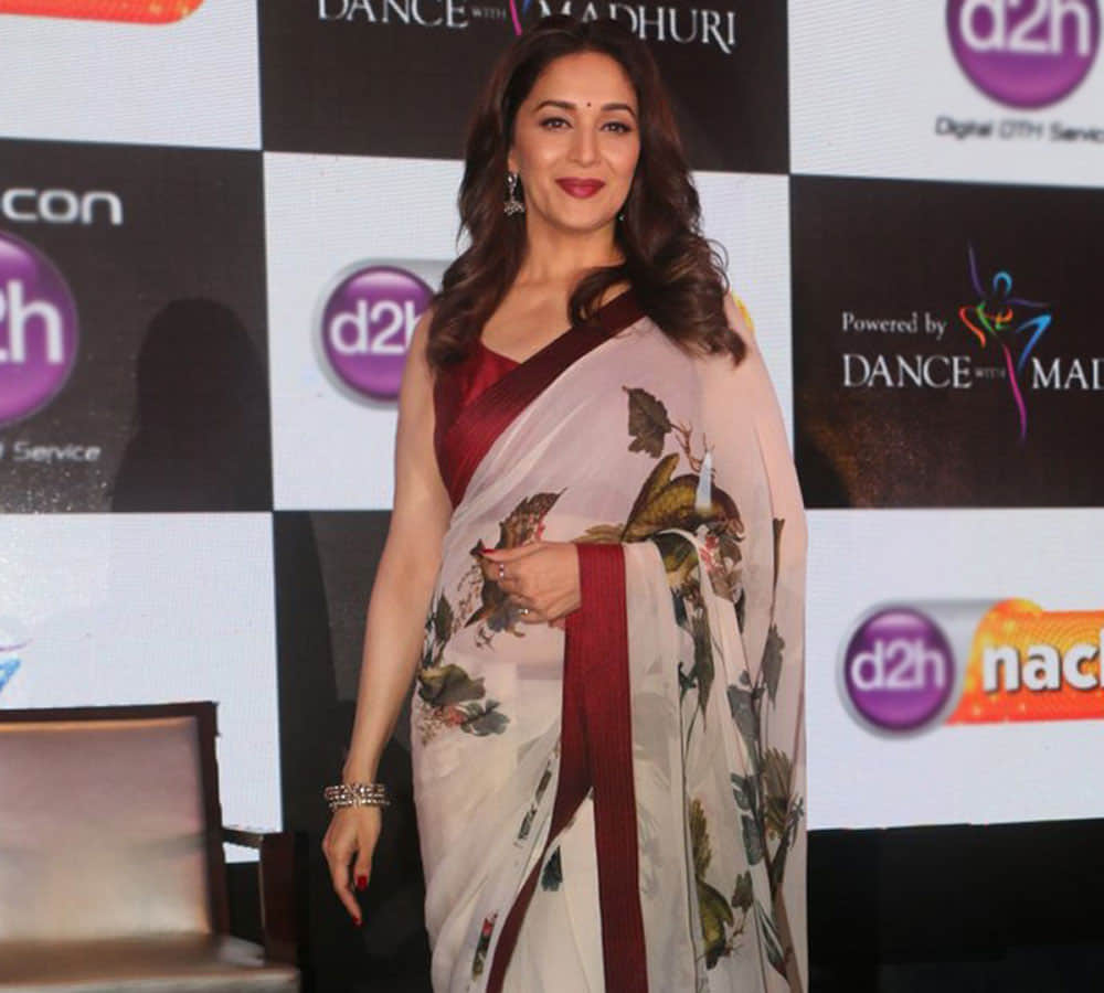 Madhuri Dixit Escapes An fall down At A Recent Event