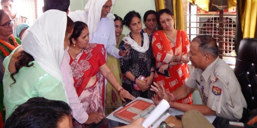 The women beaten to protest contracts, stress in town
