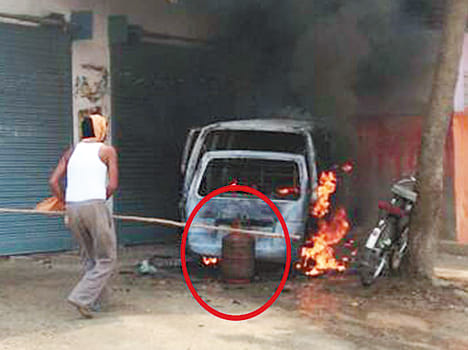 A fire in the van while filling gas with the cylinder