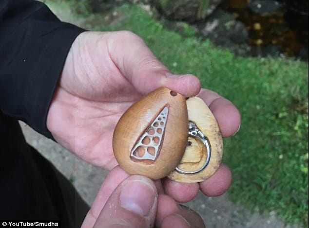 engagement ring was sealed in wooden necklece